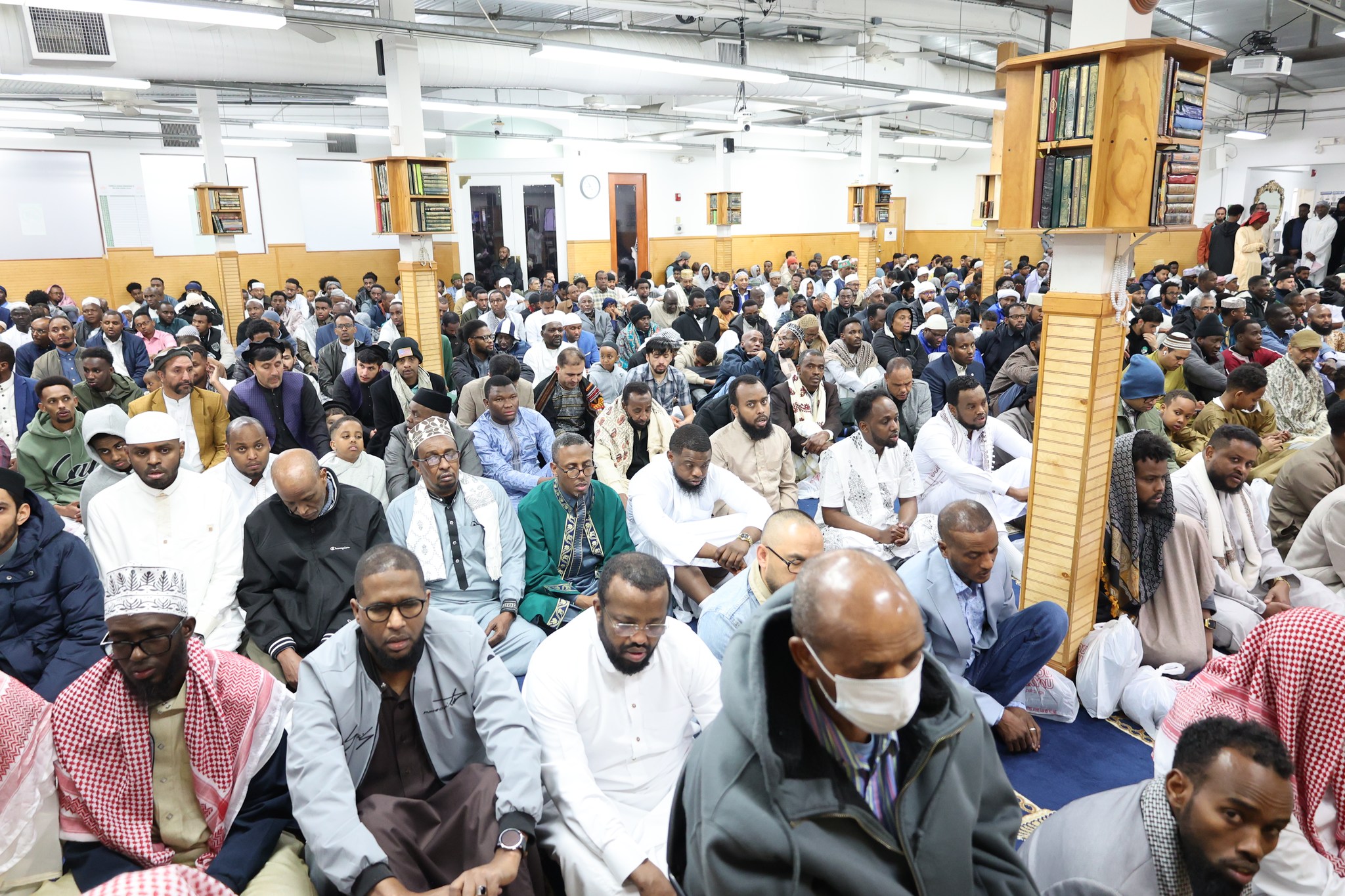 Abubakr Islamic Center of WA prayer hall filled for a large community gathering in Tukwila