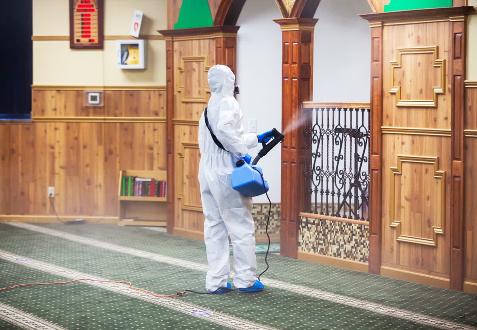 Abubakar As-Saddique Islamic Center prayer hall being cared for between gatherings