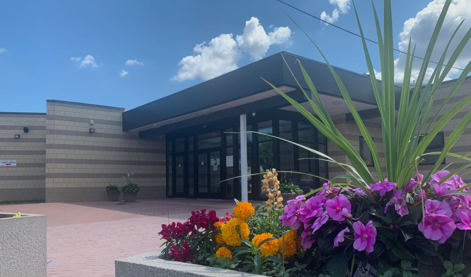 Al-Masjid Alomary exterior and entrance landscaping on Rocky River Drive in Cleveland
