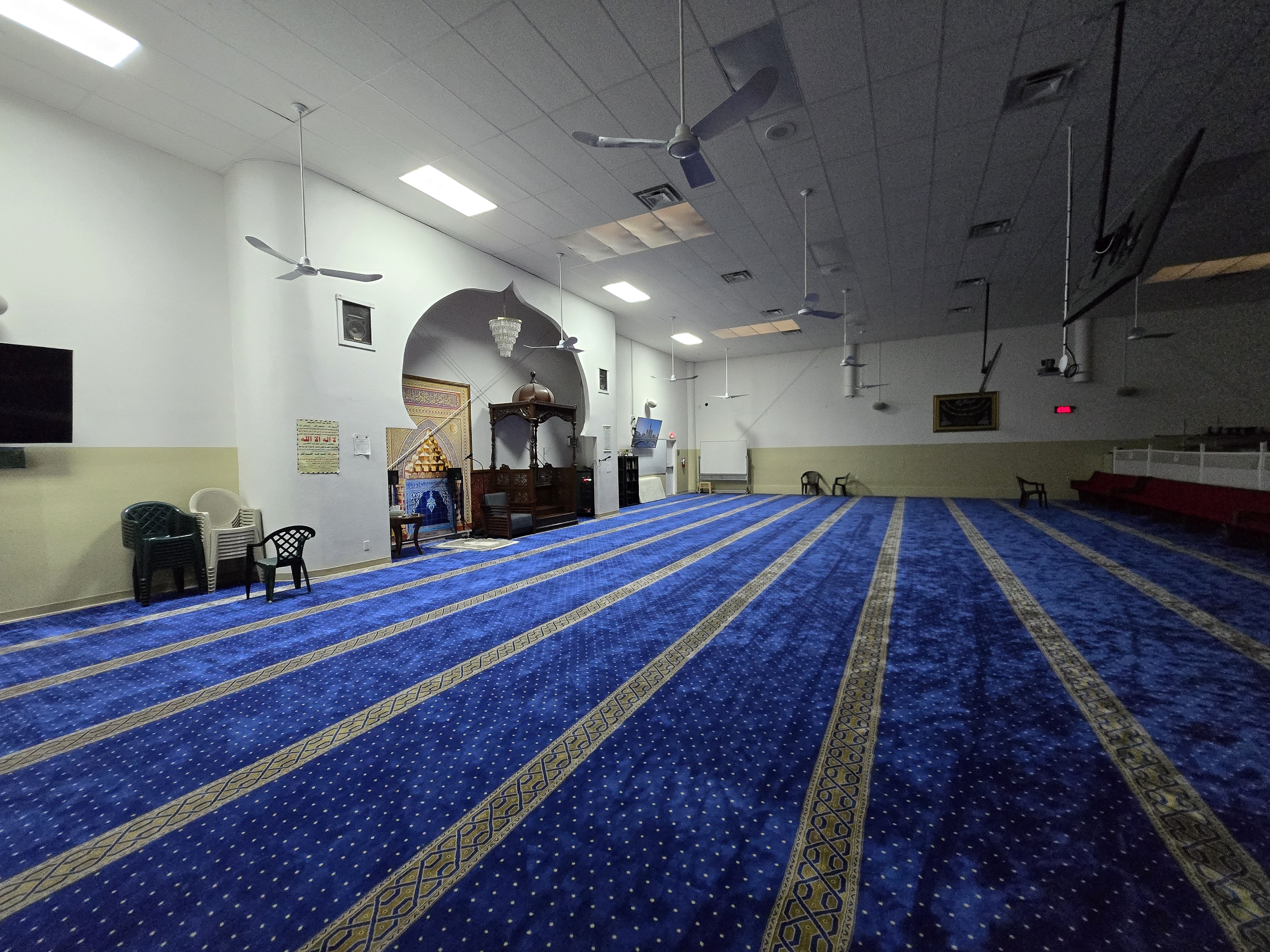 Masjid Al-Raheem blue-carpeted prayer hall in Orlando, Florida