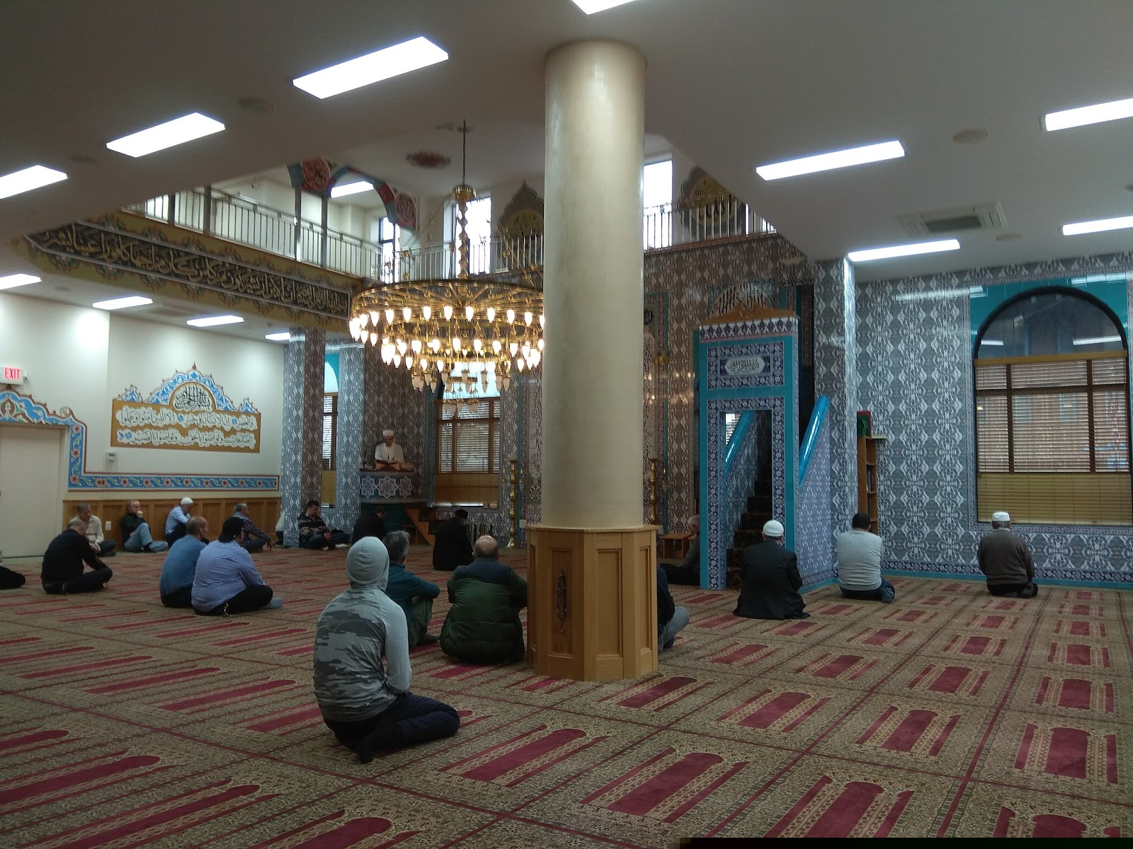 Worshippers seated inside American Turkish Eyup Sultan Cultural Center in Brooklyn, New York