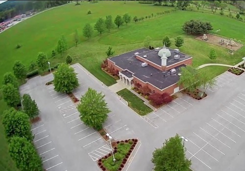 Aerial view of Dar El-Eman Islamic Center campus and parking lot