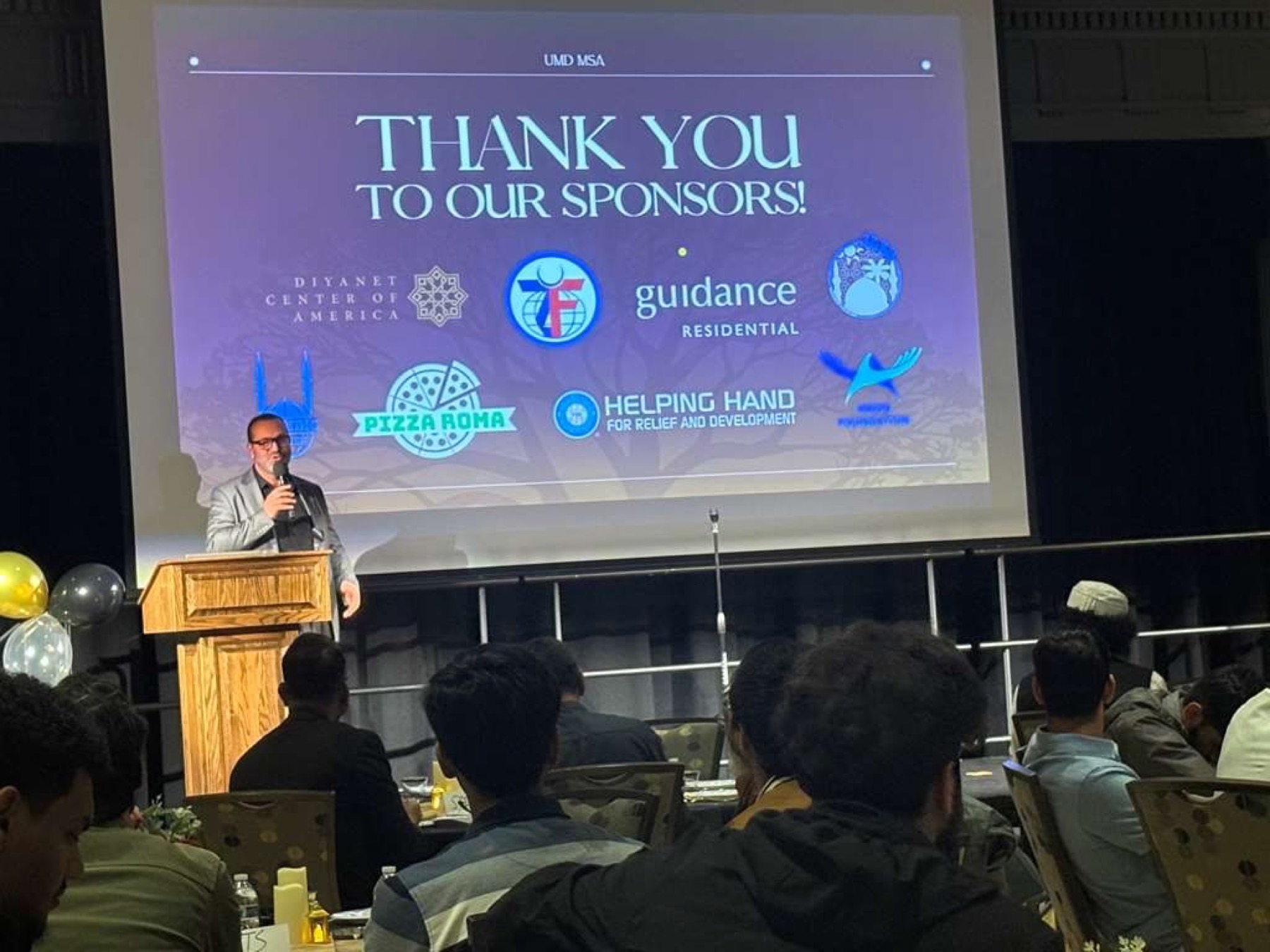Diyanet Center of America auditorium program with attendees
