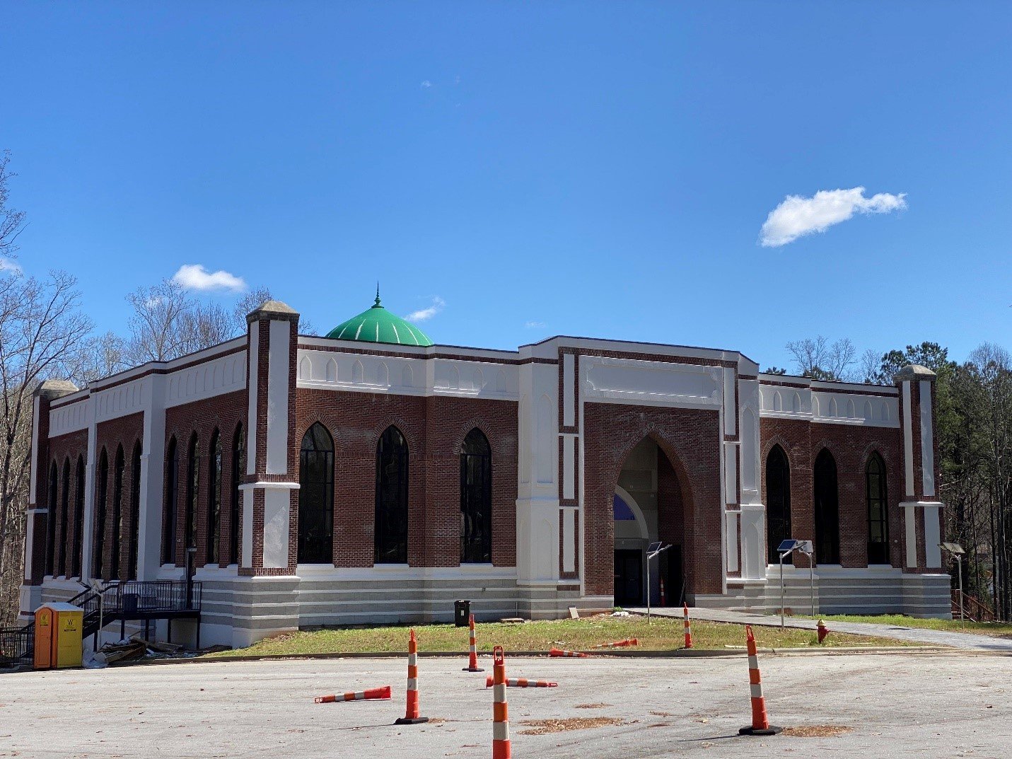Islamic Association of Cary exterior with green dome on W Chatham Street