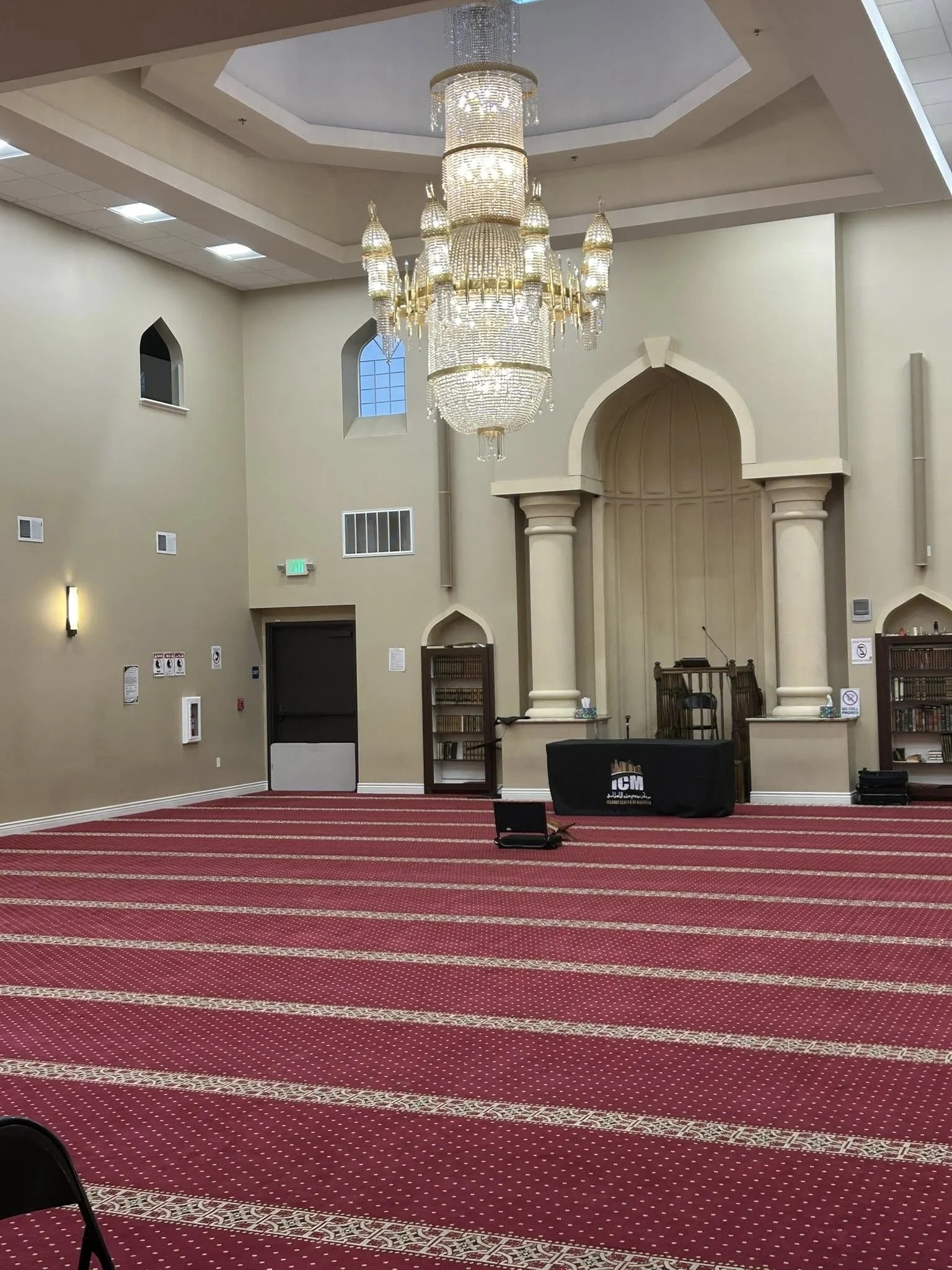 Islamic Center of Modesto prayer hall interior with mihrab and chandelier