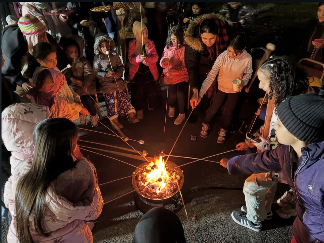 Islamic Center of Morris County youth campfire activity photo from the official ICMC site