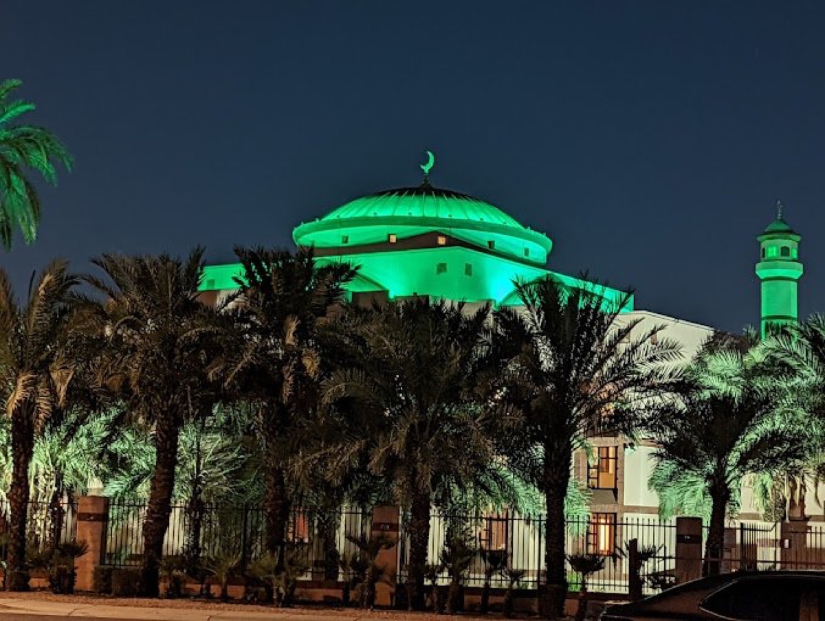 ICCP dome and minaret lit green at night in Phoenix