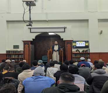 Prayer hall gathering inside Arlington Center Masjid
