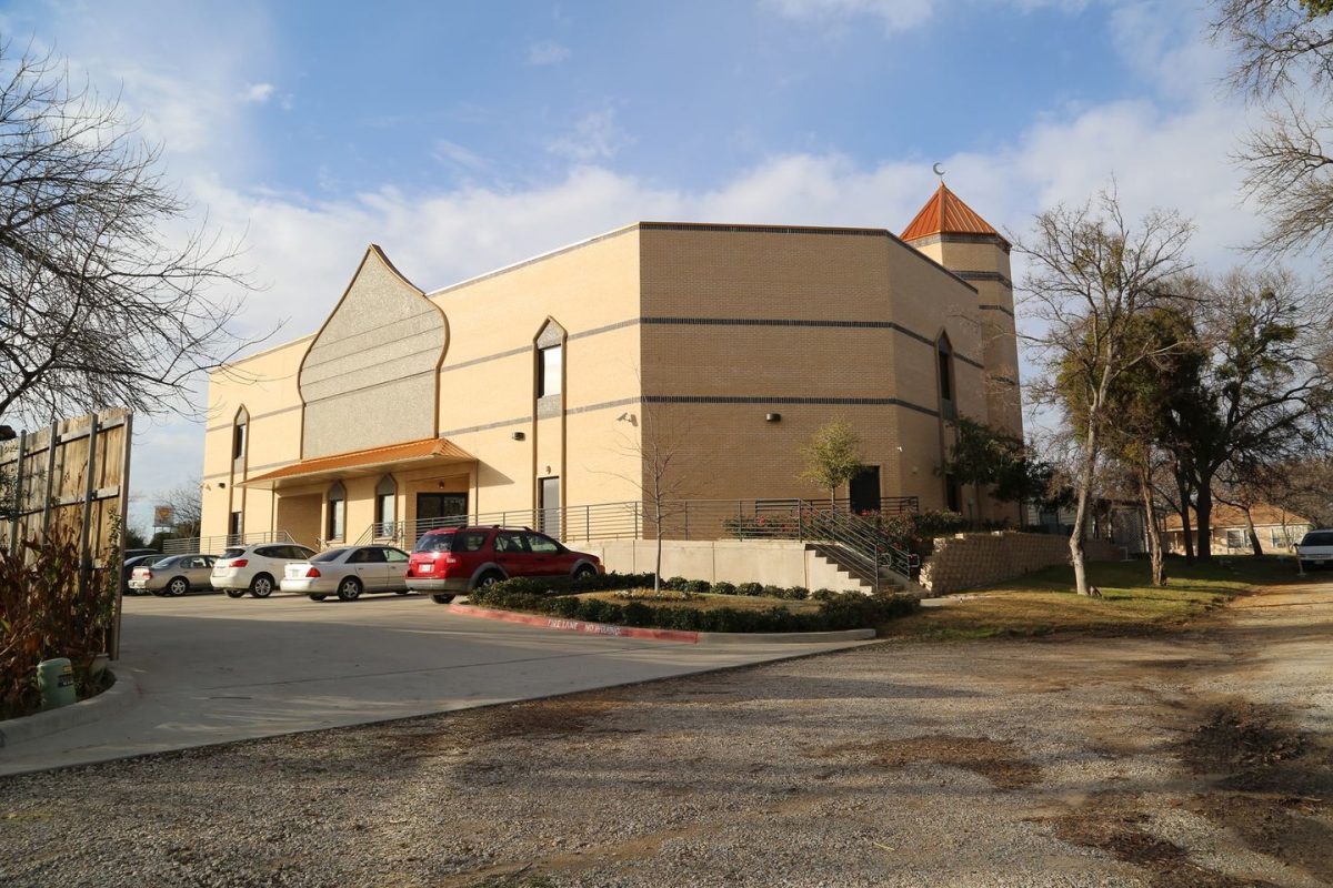 Side view of the Islamic Society of Denton campus and parking area