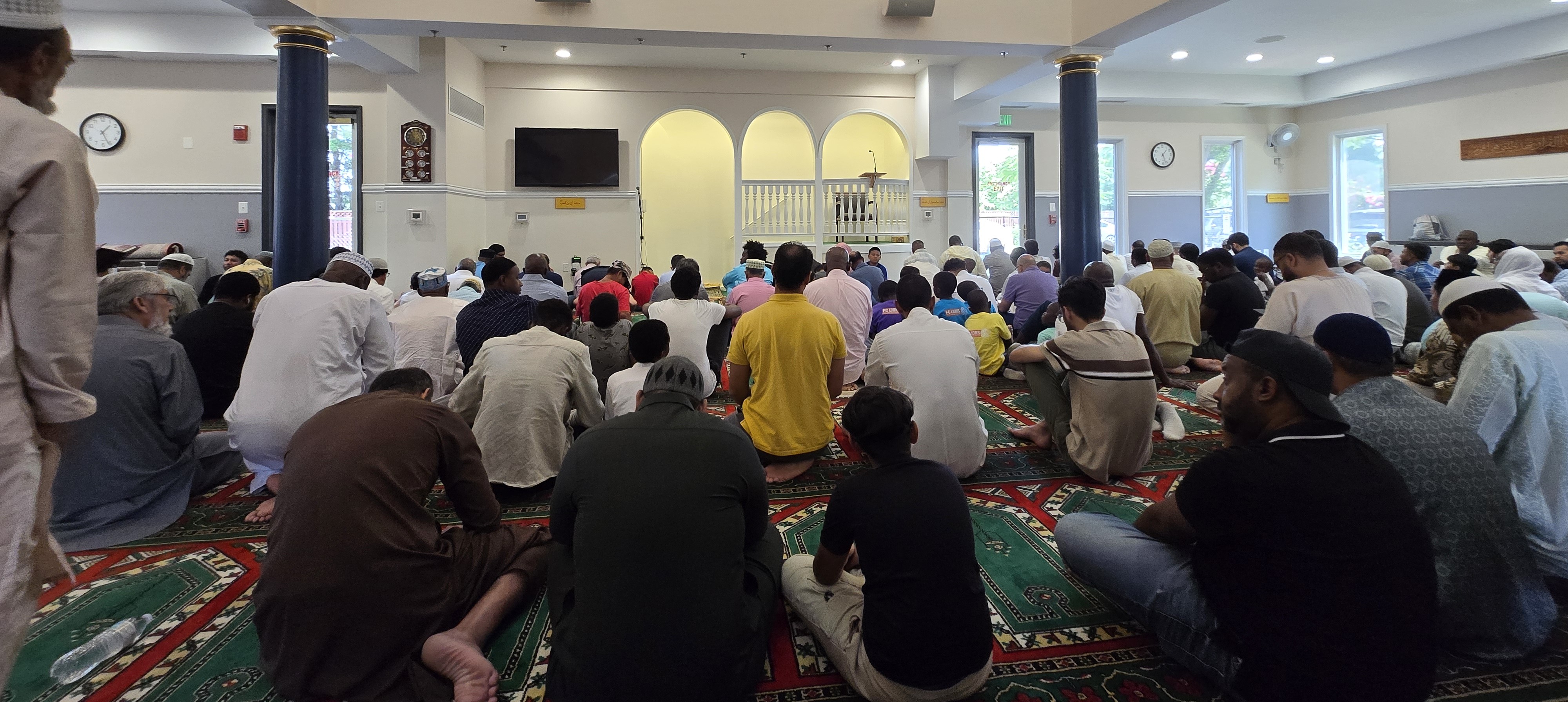 Islamic Society of Germantown prayer hall with congregants in Germantown, Maryland