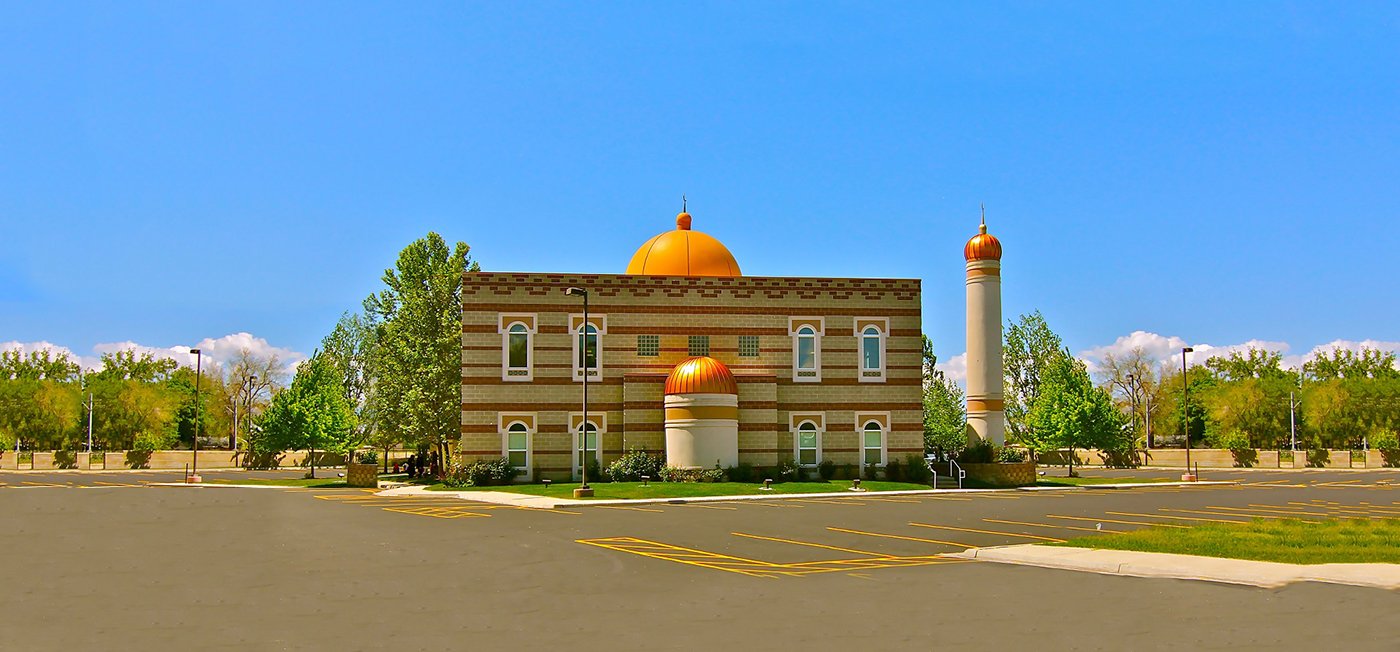 Wide exterior view of Khadeeja Islamic Center and parking area