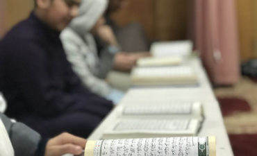Quran class at Manassas Muslim Association with students reading mushafs