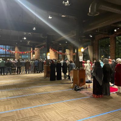 MAPS Seattle downtown prayer space with congregants standing in prayer