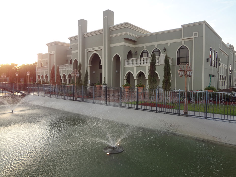 Maryam Islamic Center exterior and pond on Sartartia Road in Sugar Land