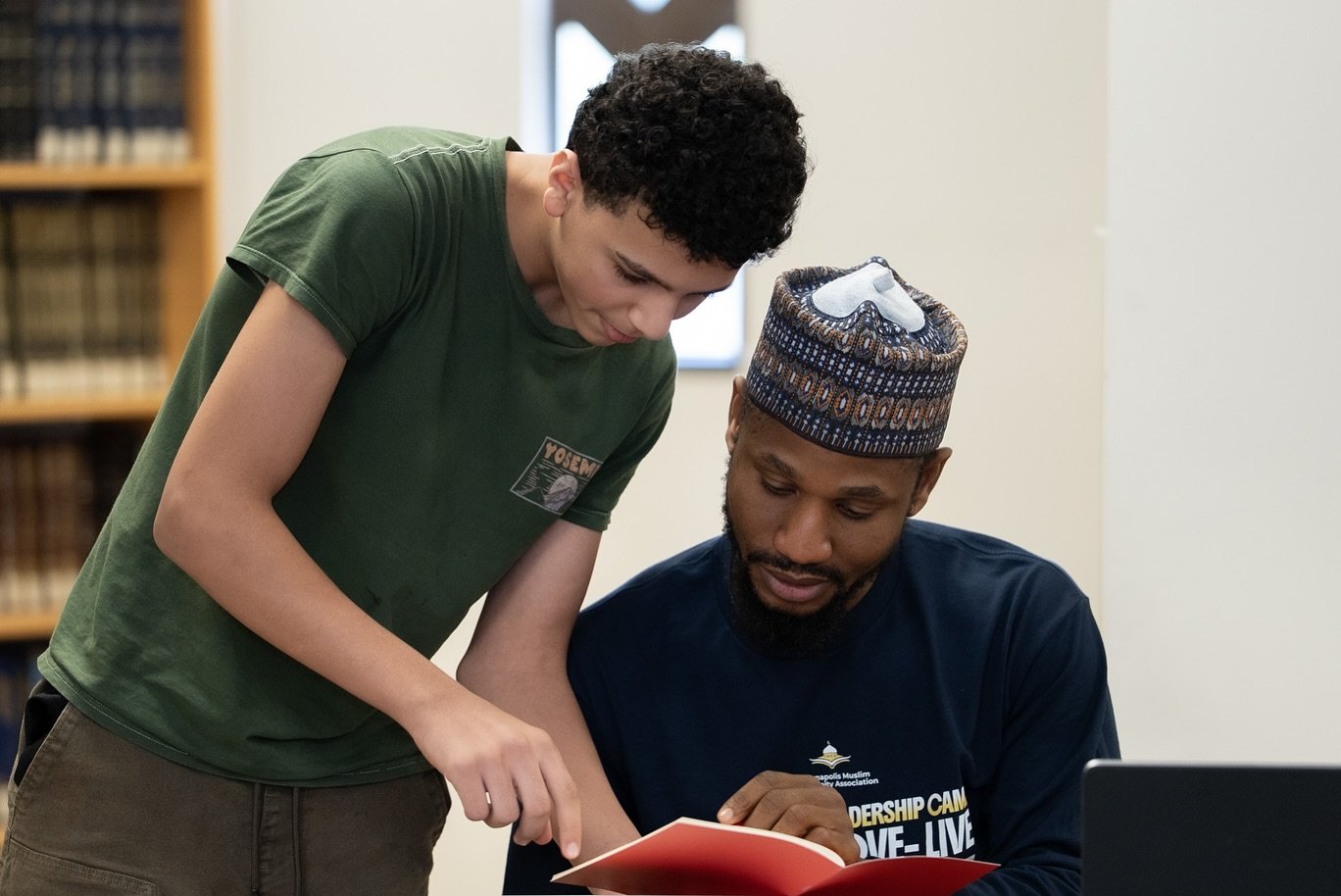 Masjid Al-Fajr Quran program with student and teacher reading together