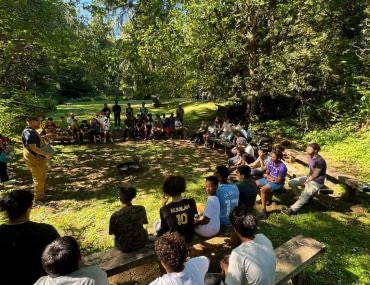 Masjed Assaber youth program gathering outdoors in a park setting