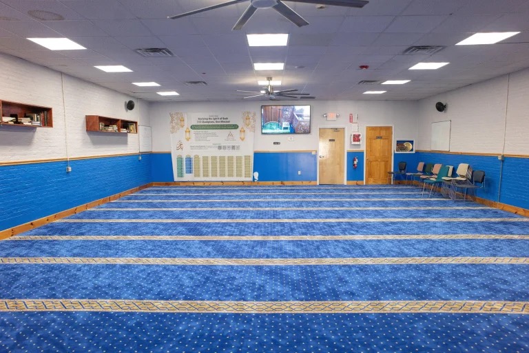 Masjid as-Salaam lower prayer and community hall with blue carpet