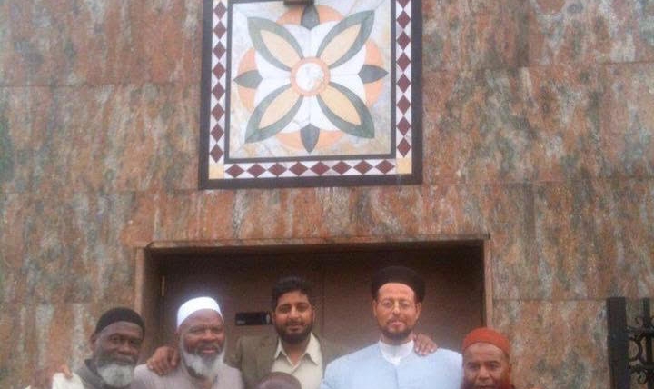 Masjid At-Taqwa community members outside the Brooklyn masjid entrance