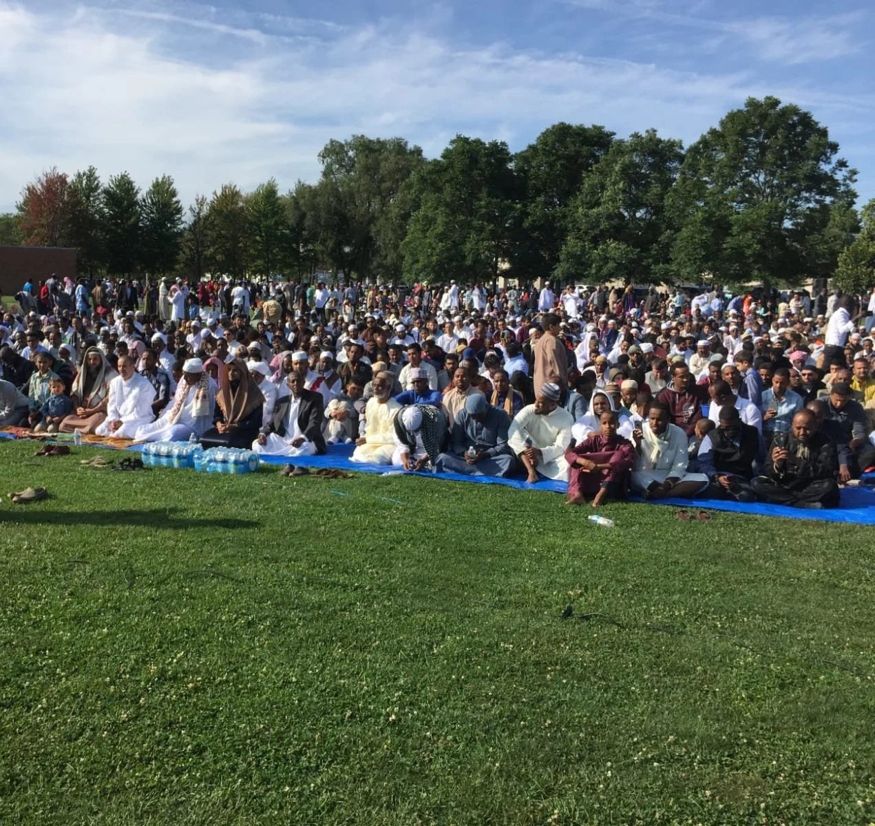 Large outdoor community prayer gathering for Masjid Darul Quran