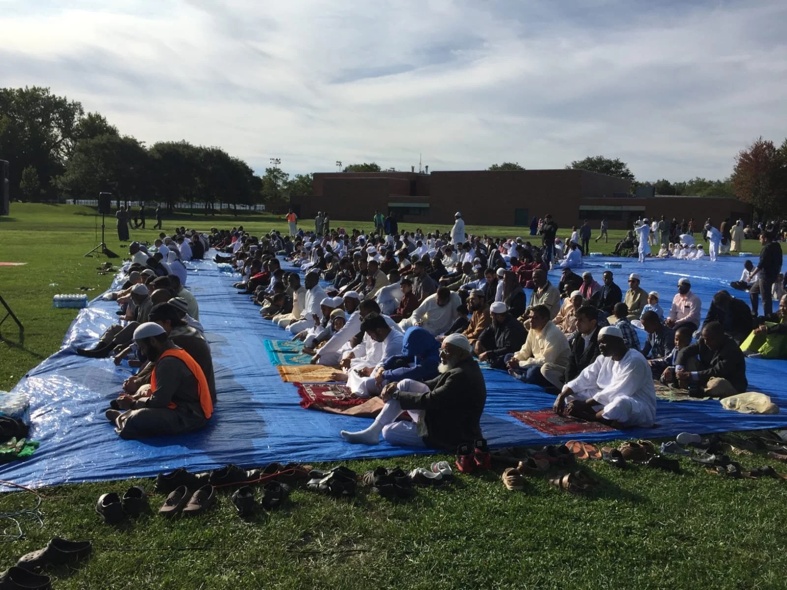 Outdoor Eid prayer gathering connected to Masjid Darul Quran
