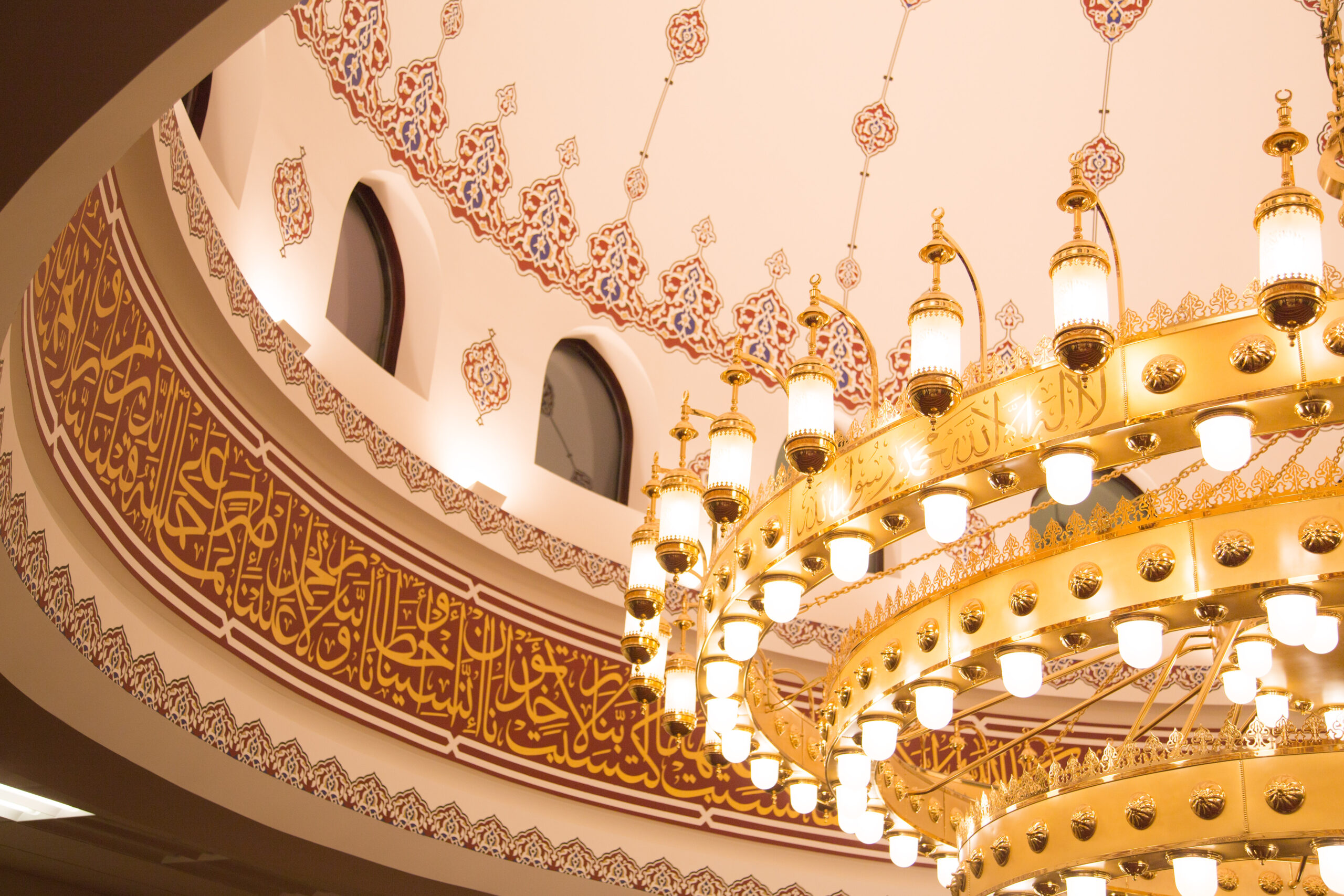 Masjid DarusSalam chandelier and Arabic calligraphy inside the Lombard prayer hall