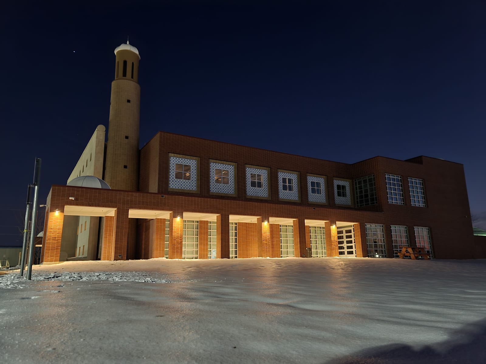 Side view of the Mesquite Islamic Center building and covered entrances