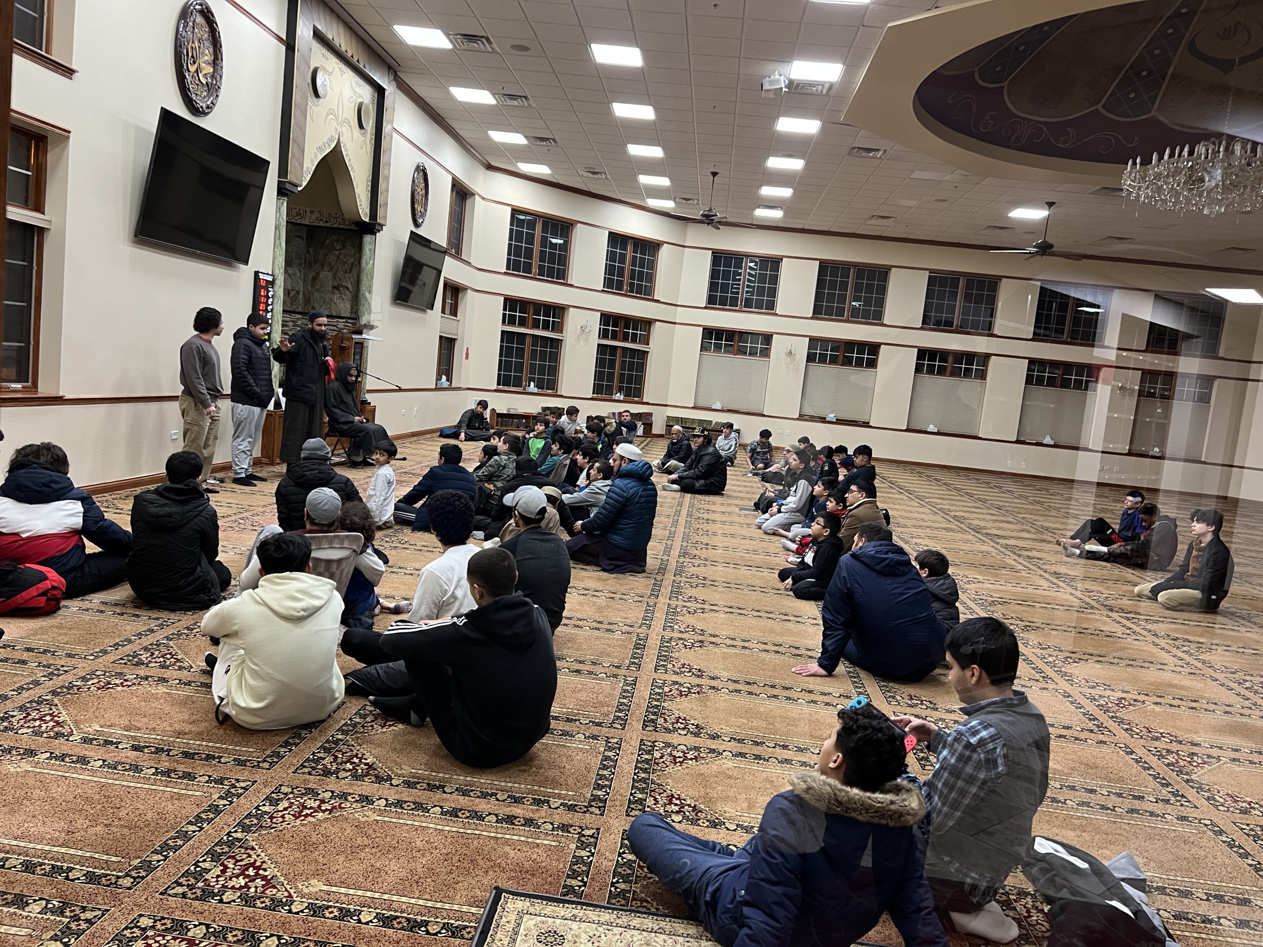 Youth gathering inside the Muslim Association of Greater Rockford prayer hall