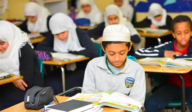 Rahmah Academy students reading Quran in a classroom at Muslim Community Center of Tucson