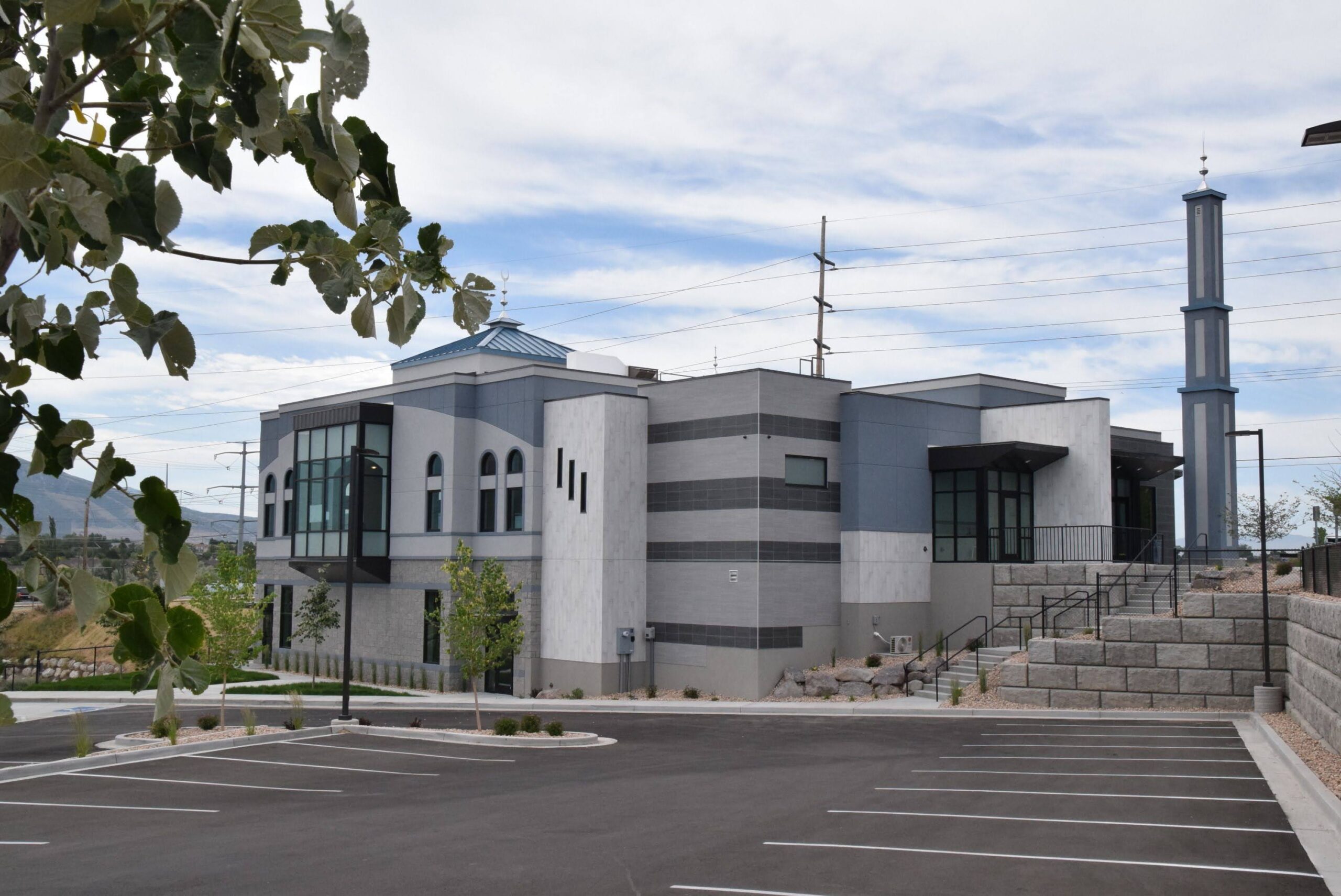 Utah Islamic Center exterior in West Jordan with minaret and campus parking