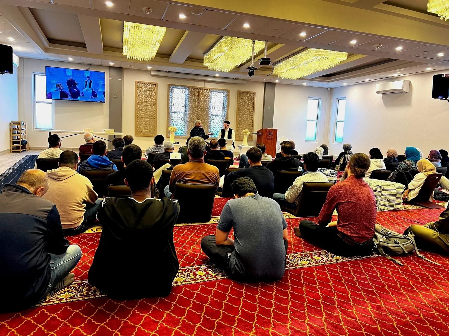 Yaseen Foundation community program gathering inside the Burlingame center